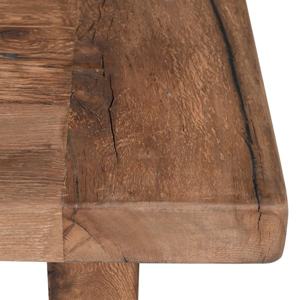 This elegant coffee table is crafted from chunky, reclaimed oak, showcasing a tasteful blend of rustic charm and eco-conscious luxury.