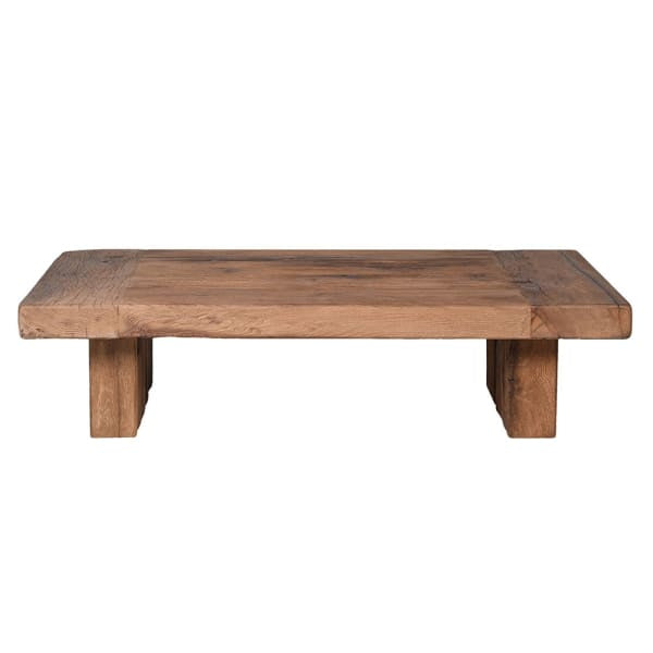 This elegant coffee table is crafted from chunky, reclaimed oak, showcasing a tasteful blend of rustic charm and eco-conscious luxury.