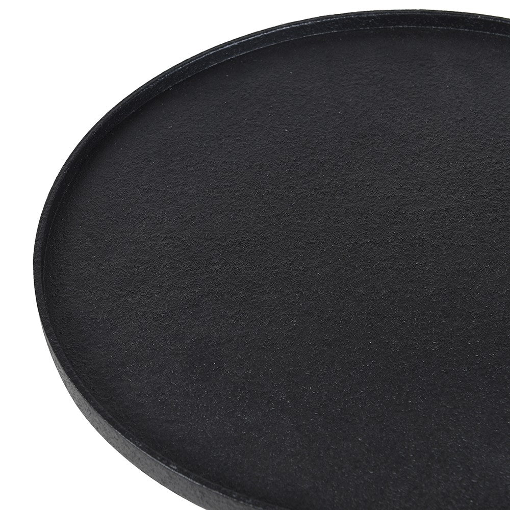 Close-up of the Amesa Metal Side Table’s textured black tabletop