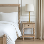 Antoine bedside table in limewashed oak with turned legs, single drawer, and open lower shelf – rustic and elegant bedroom furniture