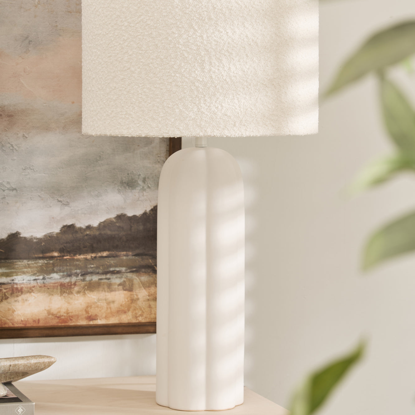 Minimalist Arlo Bouclé Table Lamp styled with artwork and neutral décor