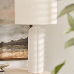 Minimalist Arlo Bouclé Table Lamp styled with artwork and neutral décor