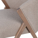 Close-up of the wooden frame and upholstery joint on the Arlo chair
