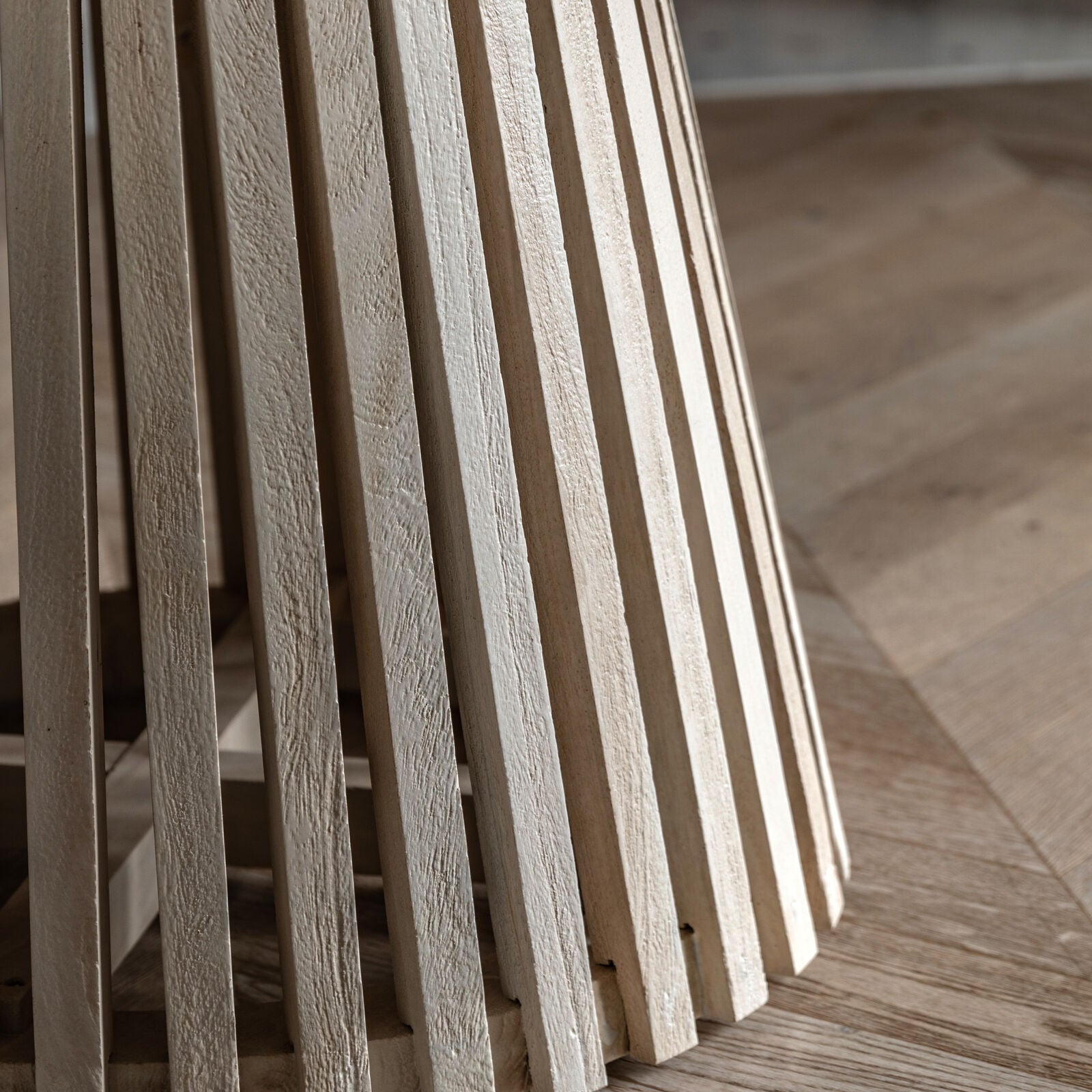 Close-up of the slatted solid mango wood base