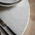 Detail of the natural Indian white marble tabletop