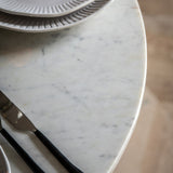 Detail of the natural Indian white marble tabletop