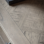 Close up of parquet wood veneer detail on Atelier cabinet