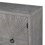 Aura Pine Four Door Sideboard with carved sunburst doors and black ring handles in weathered grey pine finish