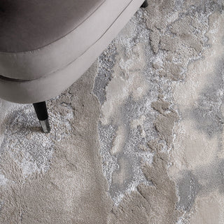 Close-up of the high shine abstract pattern on the Aurora rug in cloud