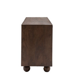 Wooden side table with round legs on a white background