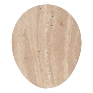  Close-up detail of a single Avebury travertine-effect coaster, showing the oval shape and natural travertine veining