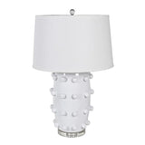  Crafted from sleek white ceramic and adorned with elegant bobble detailing, this lamp comes complete with a crisp white shade. 