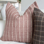 A stunning plum cotton cushion with a beautiful check Detail in cream.