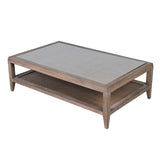 Side angle of bayur wood coffee table showing tempered glass top and woven shelf
