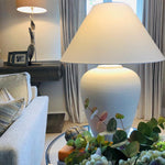 Bianca Oversized White Ceramic Table Lamp with wide shade styled in living room