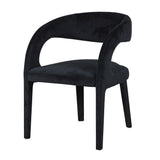 Crafted with expert craftsmanship and luxurious soft velvet fabric, the Jayden Black Open Back Chair creates a stunning and elegant addition to any room.