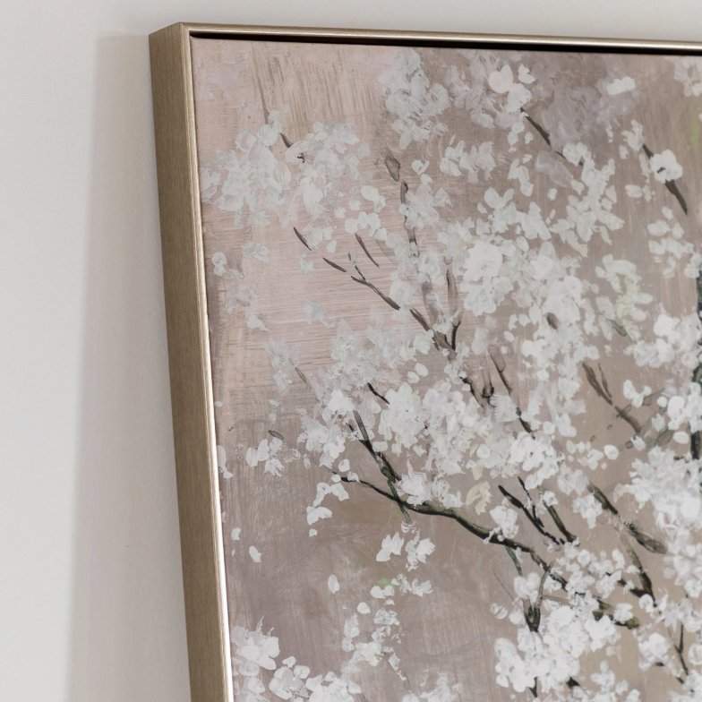 Framed artwork of a floral design on a neutral background