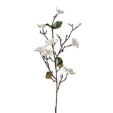 Artificial flower branch with white flowers and green leaves on a light gray background