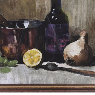 A still life painting depicting a copper muddler, a dark wine bottle, a halved lemon, a spoon, a garlic bulb, and mint leaves on a draped tablecloth, with a wooden frame visible at the bottom.
