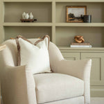 Elevate your interiors with the Bouclé Fringe Cushion, a must-have home accessory for year-round style. Crafted in a luxuriously soft light cream bouclé fabric, this cushion offers the perfect balance of warmth and freshness—cosy enough for autumn and winter, yet bright and airy for spring and summer.

Finished with a distinctive double multi-tonal clove fringe, this tactile cushion adds sophisticated texture and visual interest to any space. Its neutral hue effortlessly complements both classic and contemp