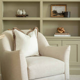 Elevate your interiors with the Bouclé Fringe Cushion, a must-have home accessory for year-round style. Crafted in a luxuriously soft light cream bouclé fabric, this cushion offers the perfect balance of warmth and freshness—cosy enough for autumn and winter, yet bright and airy for spring and summer.

Finished with a distinctive double multi-tonal clove fringe, this tactile cushion adds sophisticated texture and visual interest to any space. Its neutral hue effortlessly complements both classic and contemp