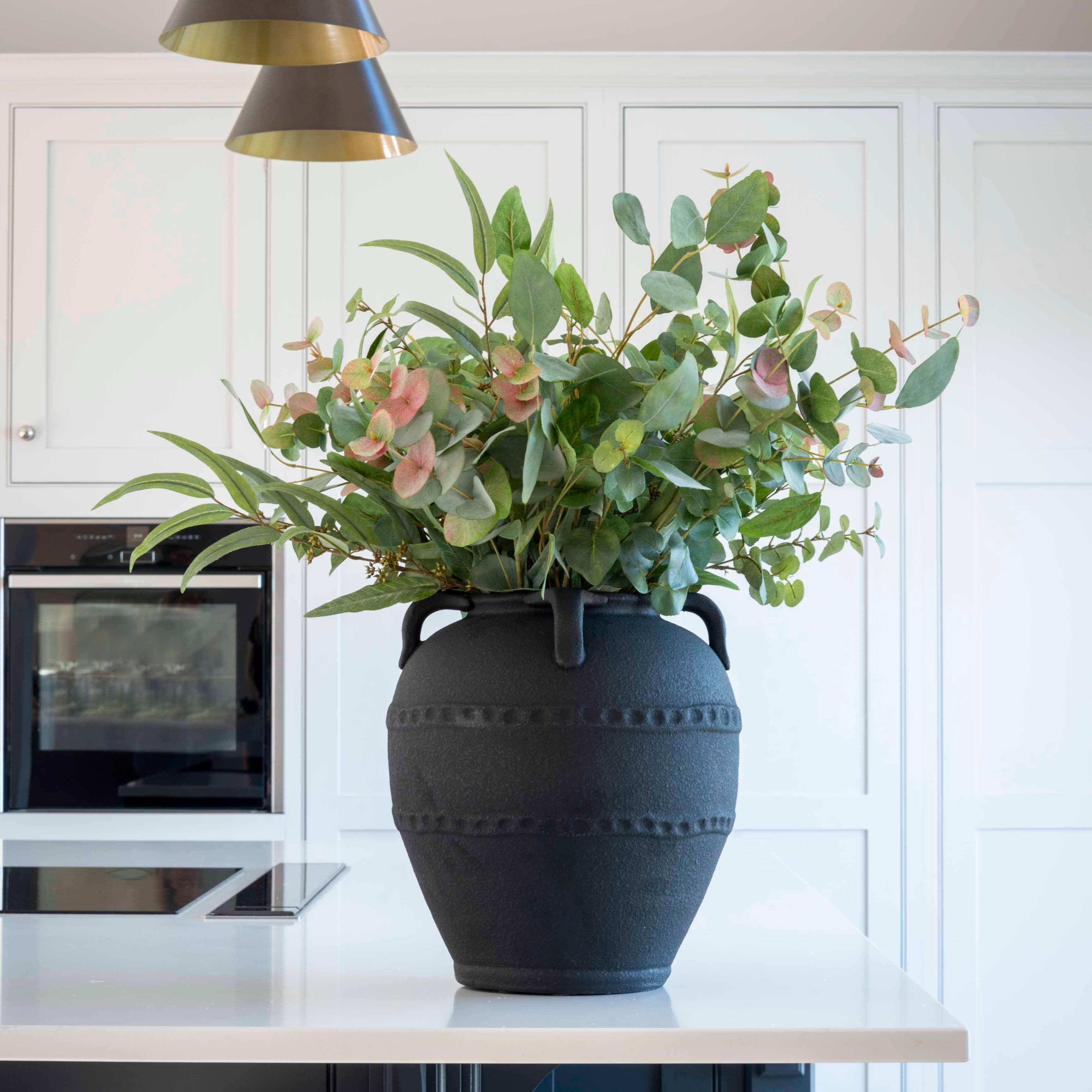 striking terracotta vase with handle detail