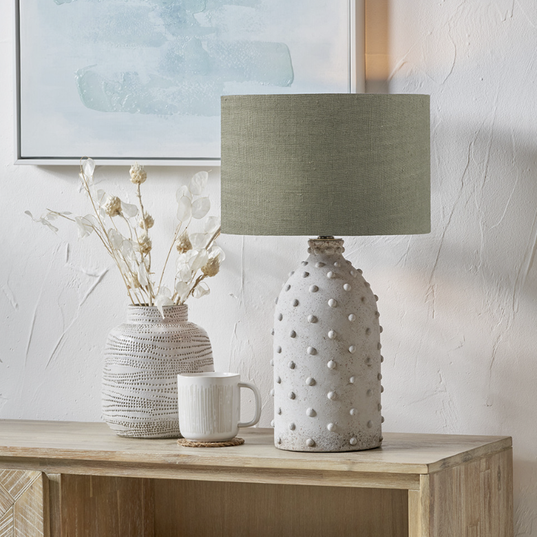 Callie ceramic table lamp with textured light grey stoneware base and pistachio green linen shade