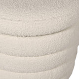 Close up of cream boucle fabric on storage footstool