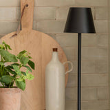 Black iron wireless lamp styled with kitchen accessories