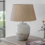 Elegant two tone ceramic table lamp with shade styled in living space