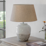 Elegant two tone ceramic table lamp with shade styled in living space