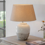 Elegant two tone ceramic table lamp with shade styled in living space
