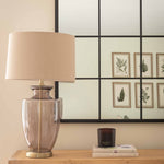 Elegant Charles Ted Tallado glass lamp on wooden console table