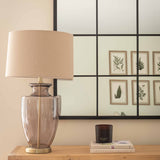 Elegant Charles Ted Tallado glass lamp on wooden console table