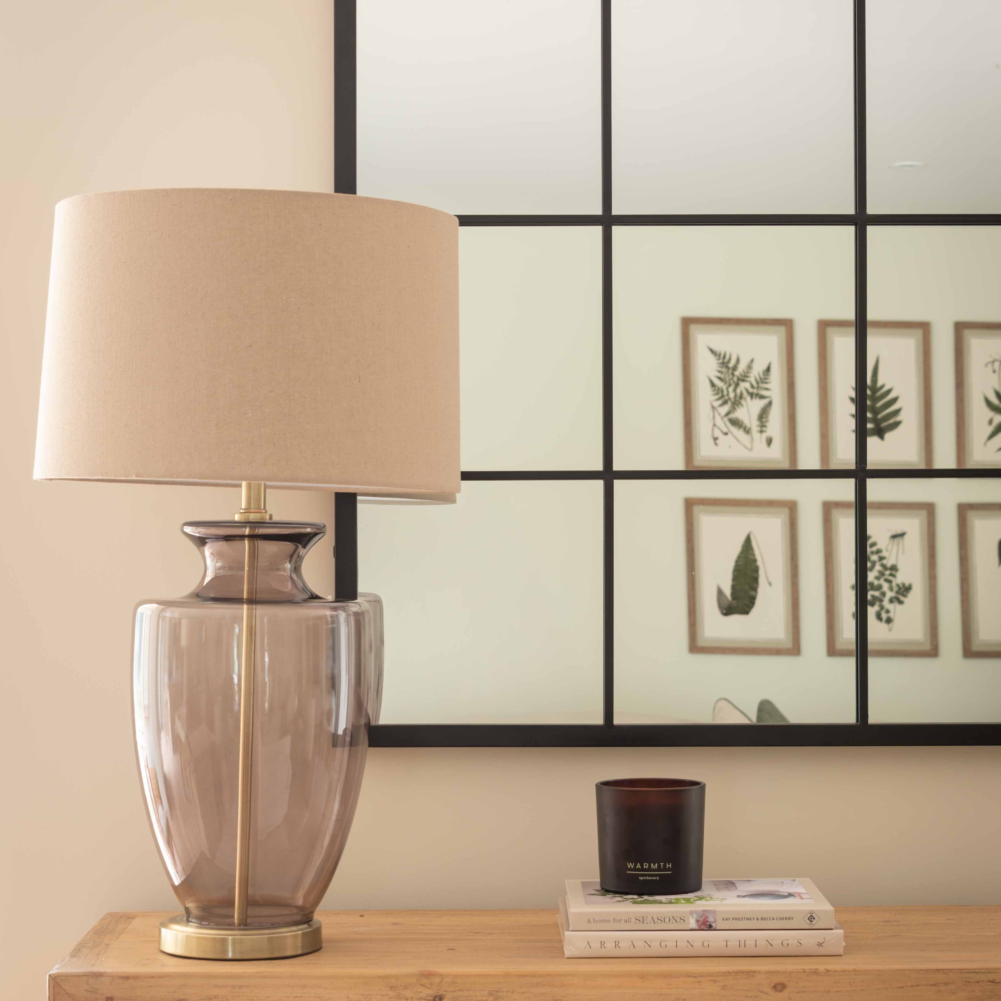 Elegant Charles Ted Tallado glass lamp on wooden console table
