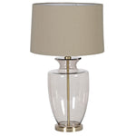 Elegant smoked glass base with brass detailing