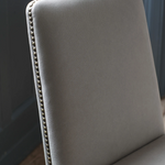 Close-up of Cleeve Linen Dining Chair stud detailing