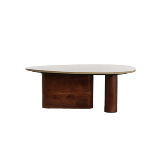 Como coffee table showing free-form travertine top and curved wood panel legs