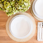 Round stoneware dinner plate with bobbled rim