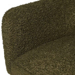 Deanna Olive Green Faux Sheepskin Dining Chair - a luxurious addition to elevate any dining space. Its elegant design, featuring faux sheepskin upholstery and a tasteful olive green colour, exudes exclusivity and sophistication.
