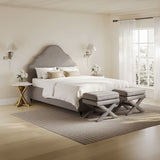 Denning light grey upholstered bed styled in modern bedroom