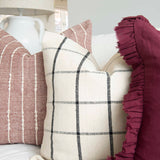 A stunning cotton cushion with a beautiful check detail. Displayed here alongside other cushions
