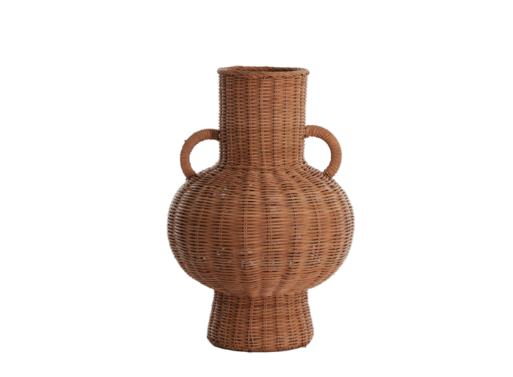 Wicker vase with two handles on a white background