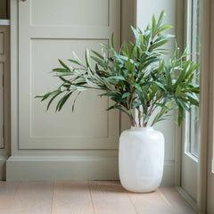 Enhance your interior with this beautifully crafted white coloured glass vase, perfect for modern and minimalist home styling. Made from high-quality, semi-opaque glass, this decorative vase features a smooth, rounded silhouette and a glossy finish that reflects natural light beautifully. Ideal for adding a touch of elegance to shelves, console tables, or window sills, this vase blends seamlessly with neutral palettes and contemporary design themes.

Whether used as a standalone statement piece or part of a