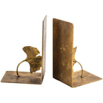 Pair of gold ginkgo leaf bookends on a white background
