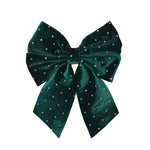 Emerald green velvet decorative bow with rhinestone accents for holiday or gift décor