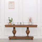 Ernest console table crafted from white cedar stained in a rich brown finish with carved column legs and beaded edge detail