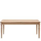Front view of Eton Extendable Table showcasing turned oak legs and smooth finish

Shopify Tags