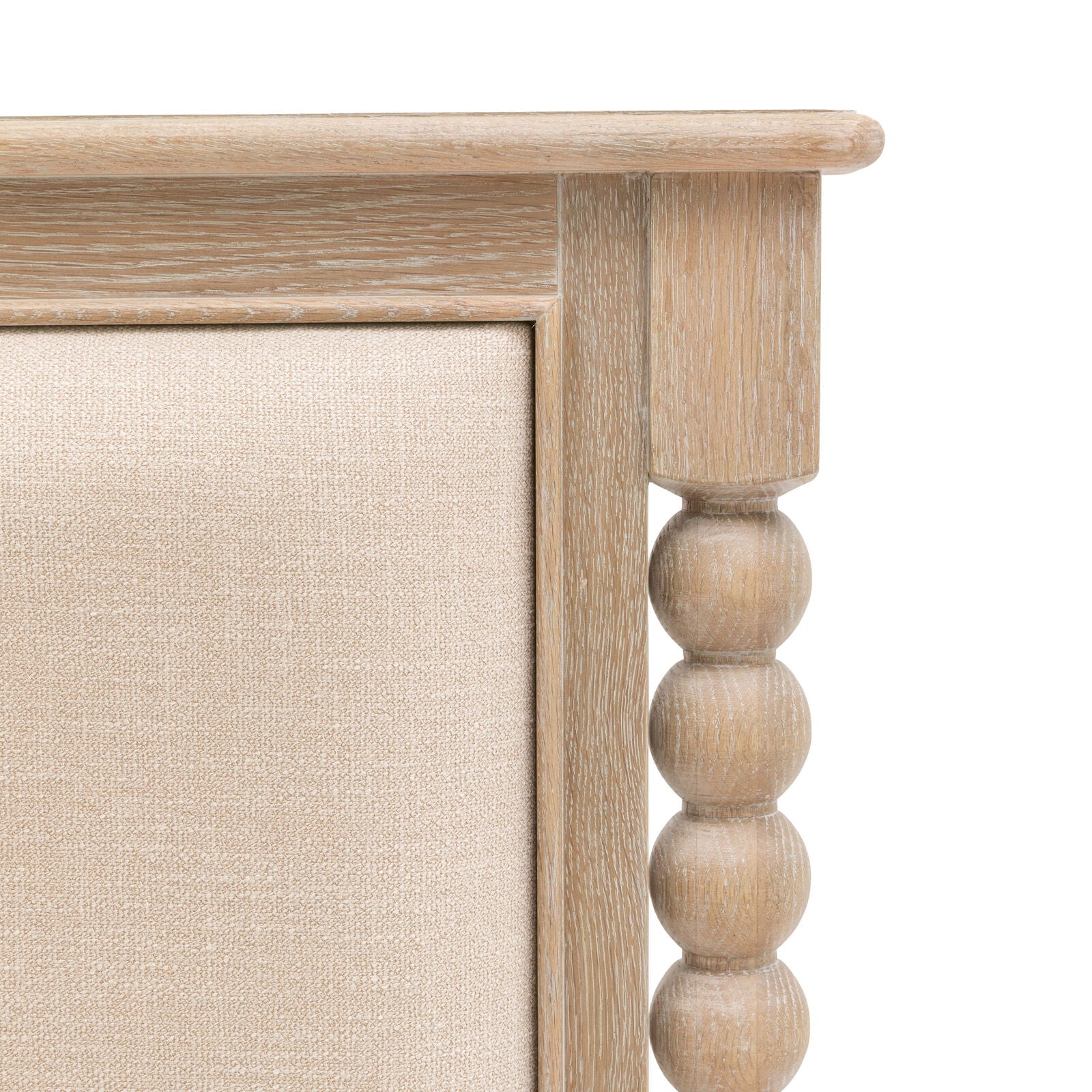 Antoine bed frame in limewashed oak with upholstered headboard and turned posts – elegant French country bedroom furniture Close up of turned  wood headboard detail
