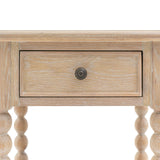 Antoine bedside table in limewashed oak with turned legs, single drawer, and open lower shelf – rustic and elegant bedroom furniture close up